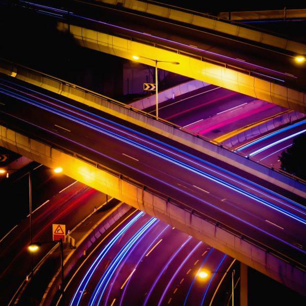 abstract-night-view-of-highway-interchange-with-mo-2021-08-26-17-19-09-utc-1-scaled.jpg